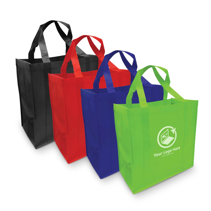 Four reusable non-woven tote bags in black, red, blue, and green (with a customized logo), arranged in a row.