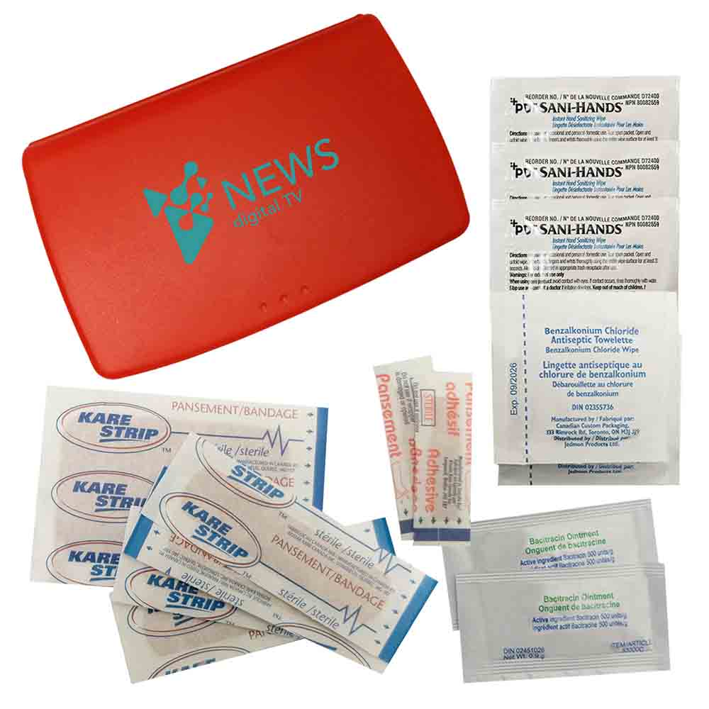 Red first aid case with “NEWS digital TV” logo, surrounded by bandages, antibiotic ointments, and sanitizing wipes