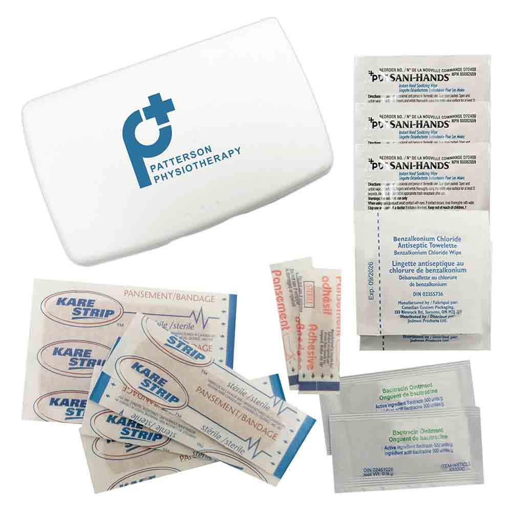 White first aid case with “Patterson Physiotherapy” logo, surrounded by bandages, antiseptic wipes, and antibiotic ointment packets.