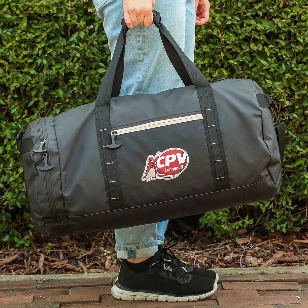 45L black duffel bag with logo, front zip pocket, and reinforced carry handles held outdoors