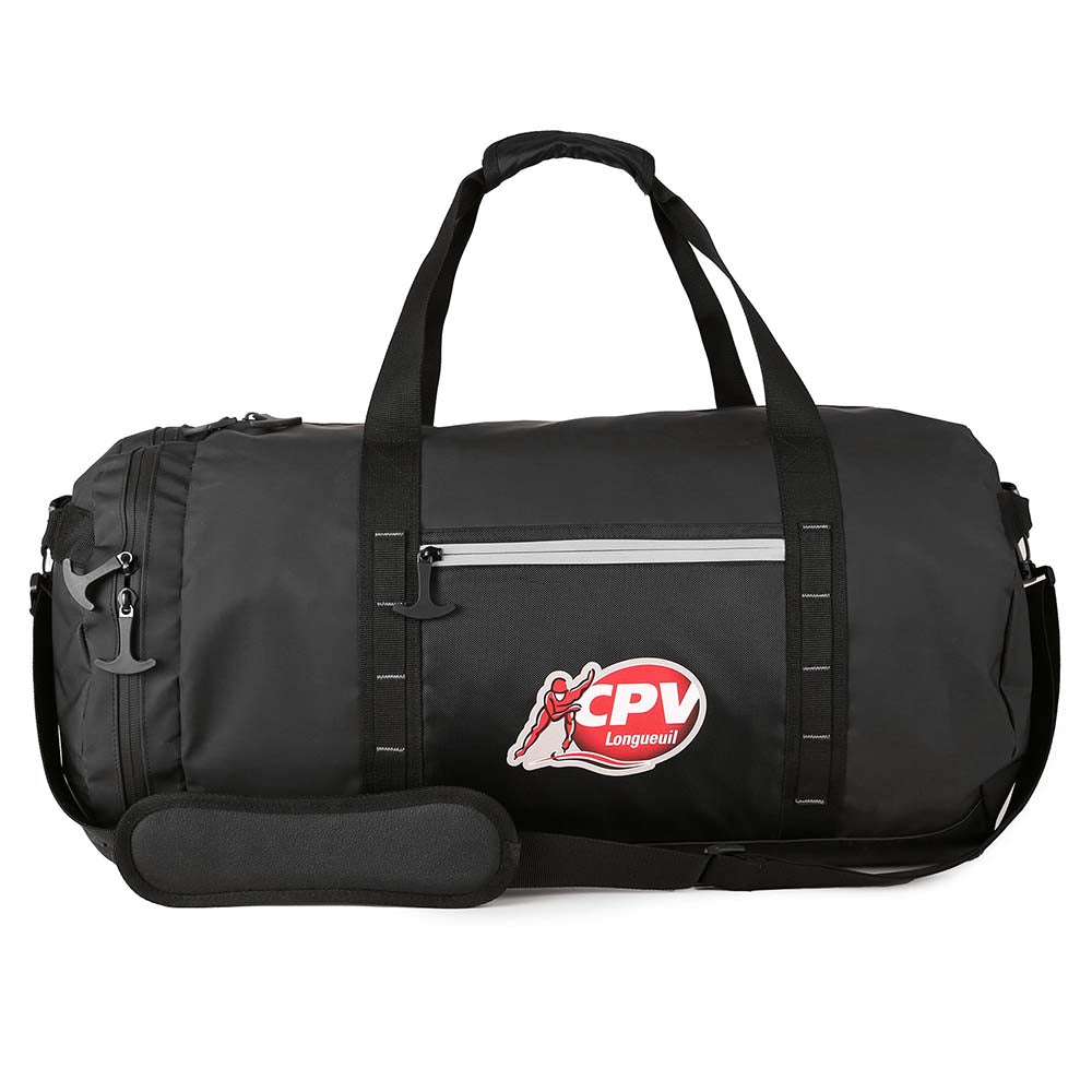 Black duffel bag worn with shoulder strap, featuring front zip pocket and outdoor setting