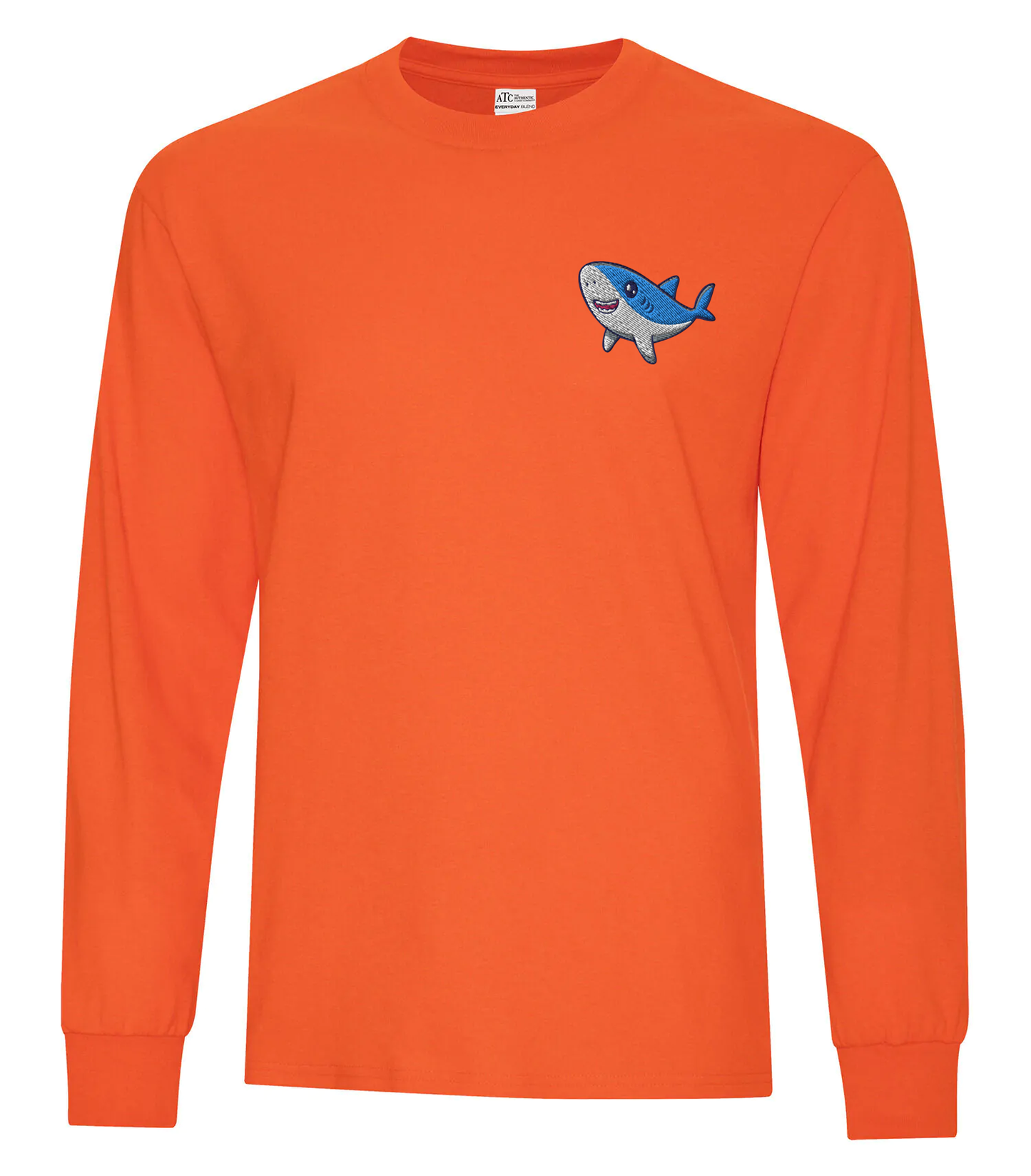 Orange long sleeve tee with small custom shark logo on chest.