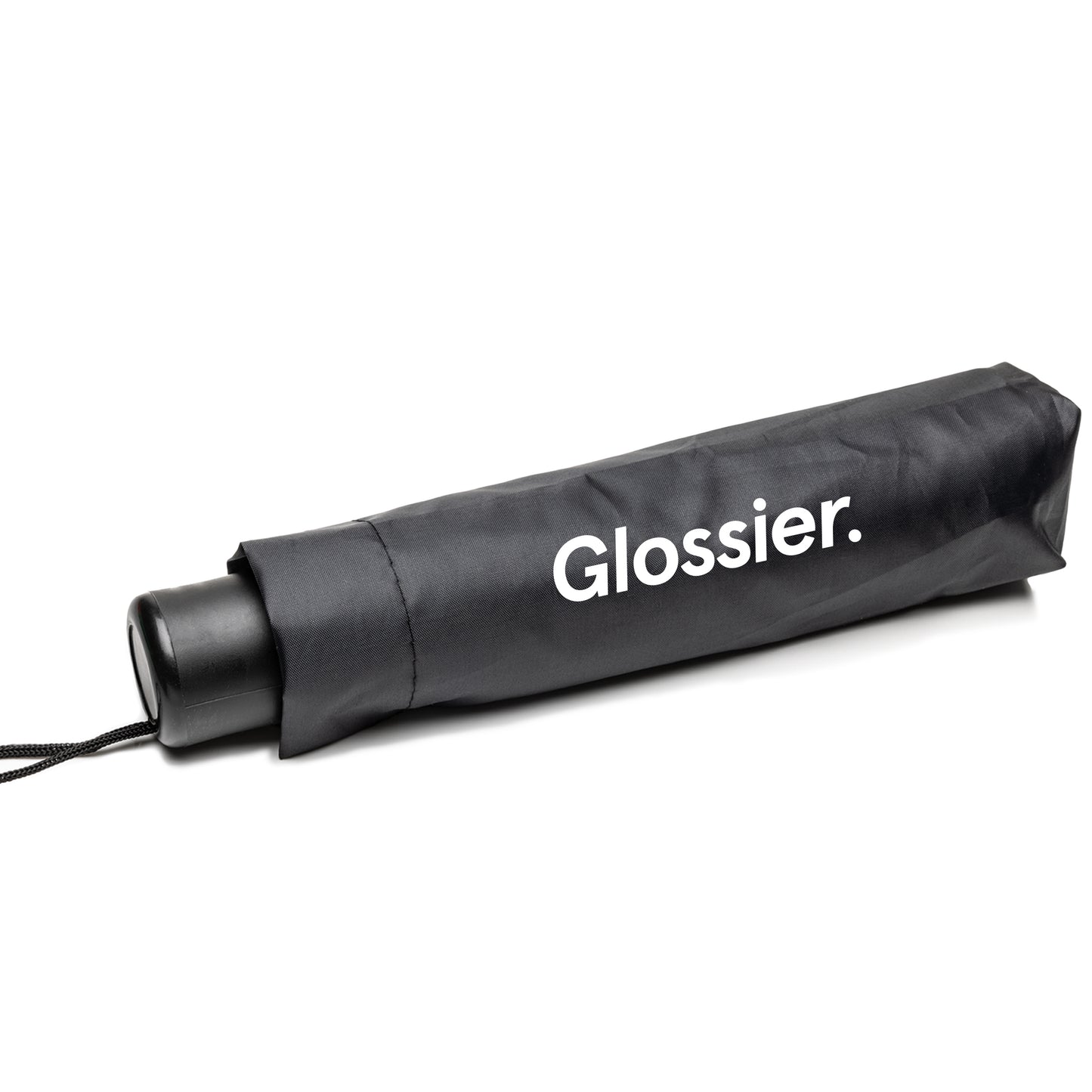 Black compact umbrella in a matching sleeve, featuring the white “Glossier.” logo and a wrist strap attached to the handle.