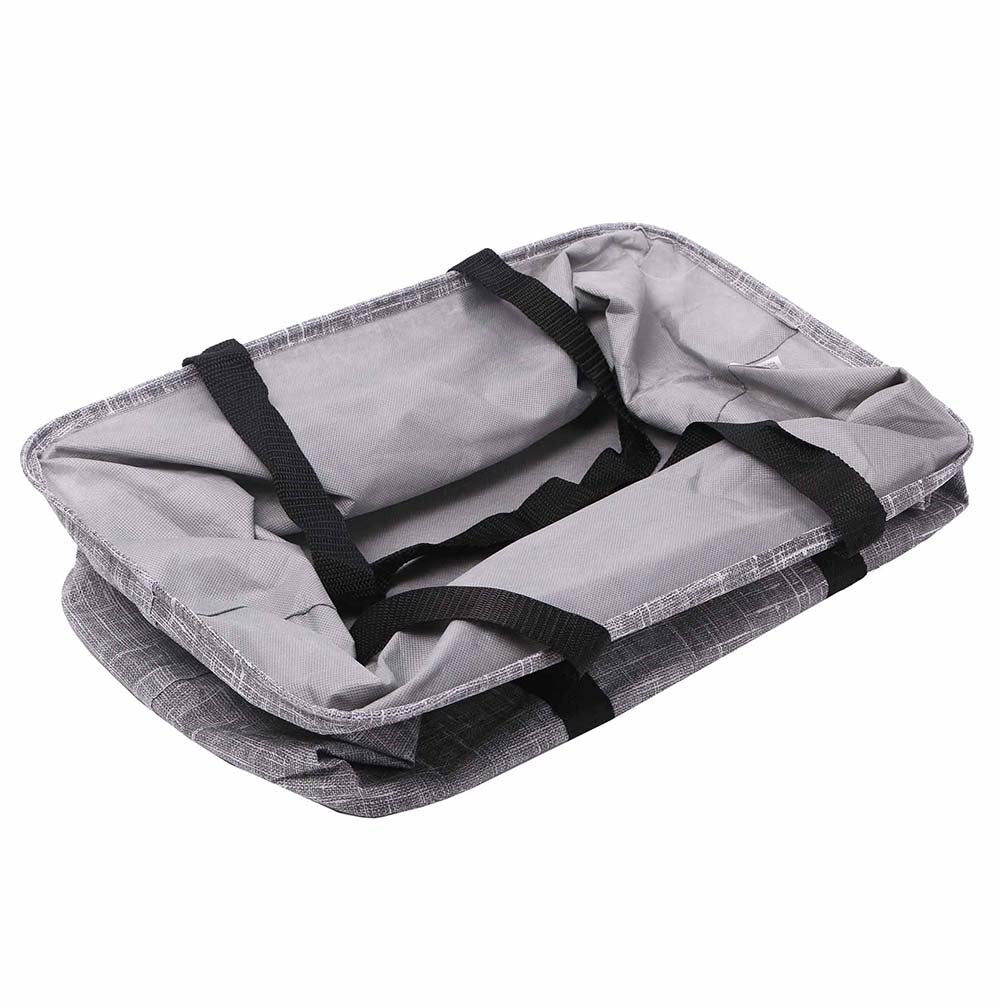Interior view of a collapsible grey tote bag with black straps, shown partially folded to highlight its flexible and spacious structure.
