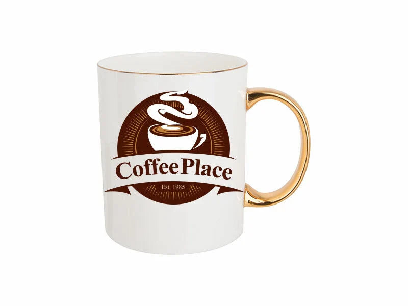 White ceramic mug with a metallic gold handle and rim, featuring a brown circular “Coffee Place” logo with a steaming cup design and “Est. 1985” text.