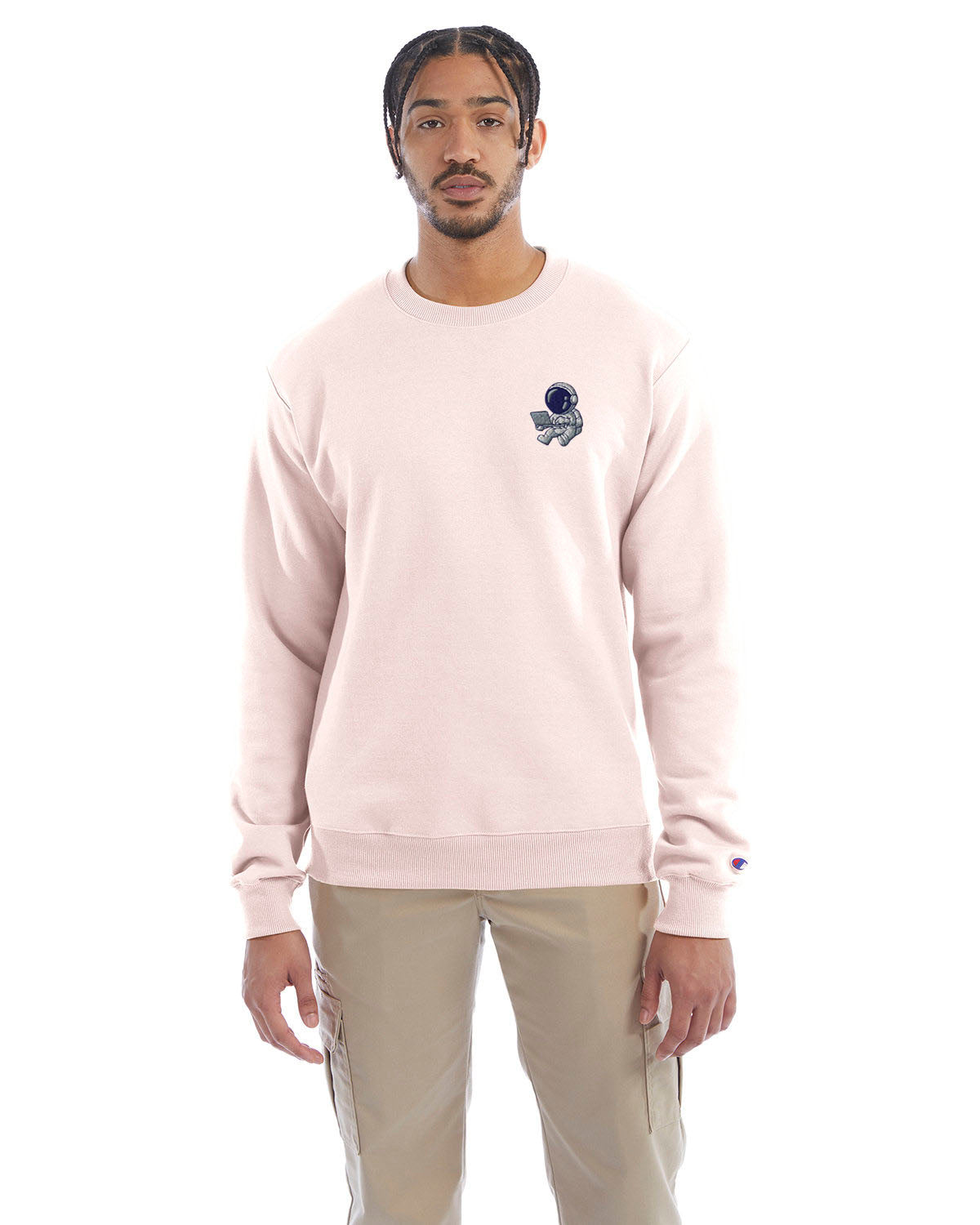 Model wearing body blush Champion crewneck sweatshirt with custom chest logo.