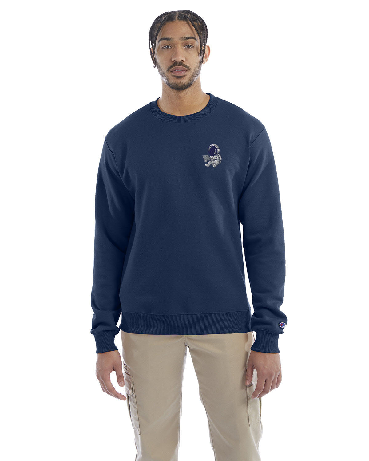 Model wearing late night blue Champion crewneck sweatshirt with custom chest logo.