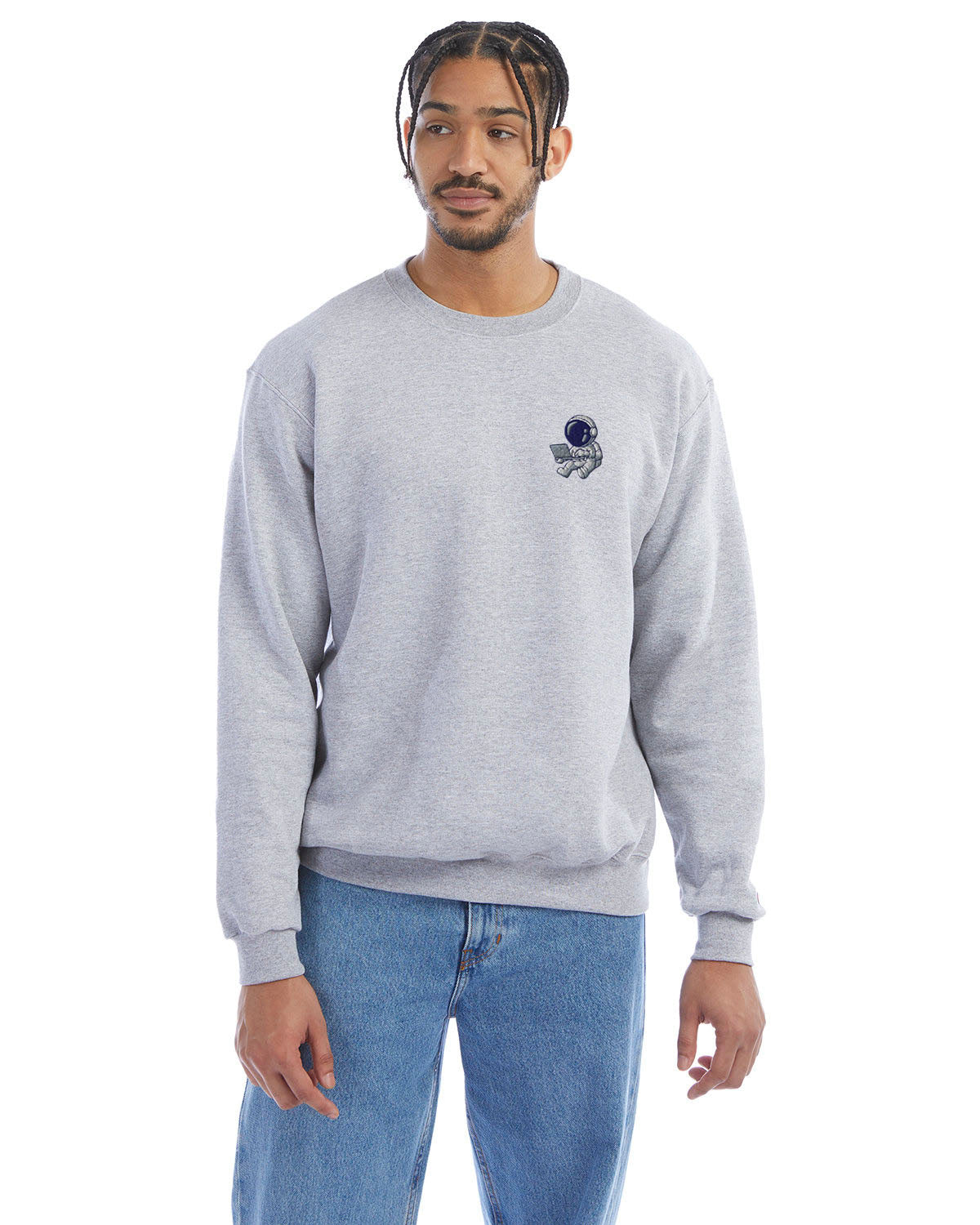 Model wearing light steel Champion crewneck sweatshirt with custom chest logo.