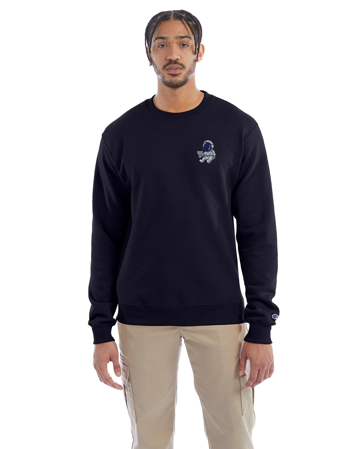 Model wearing navy Champion crewneck sweatshirt with custom chest logo.