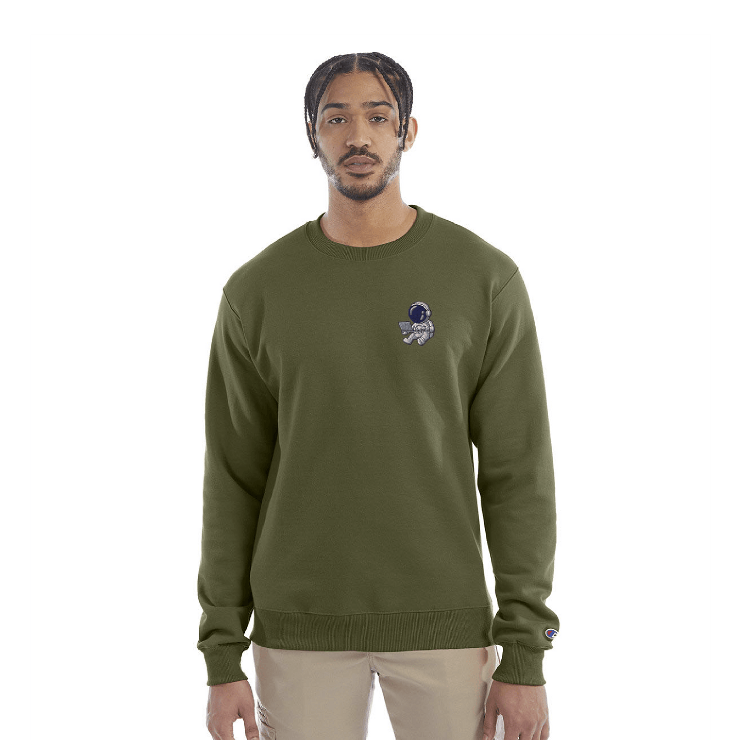 Model wearing olive green Champion crewneck sweatshirt with custom chest logo.