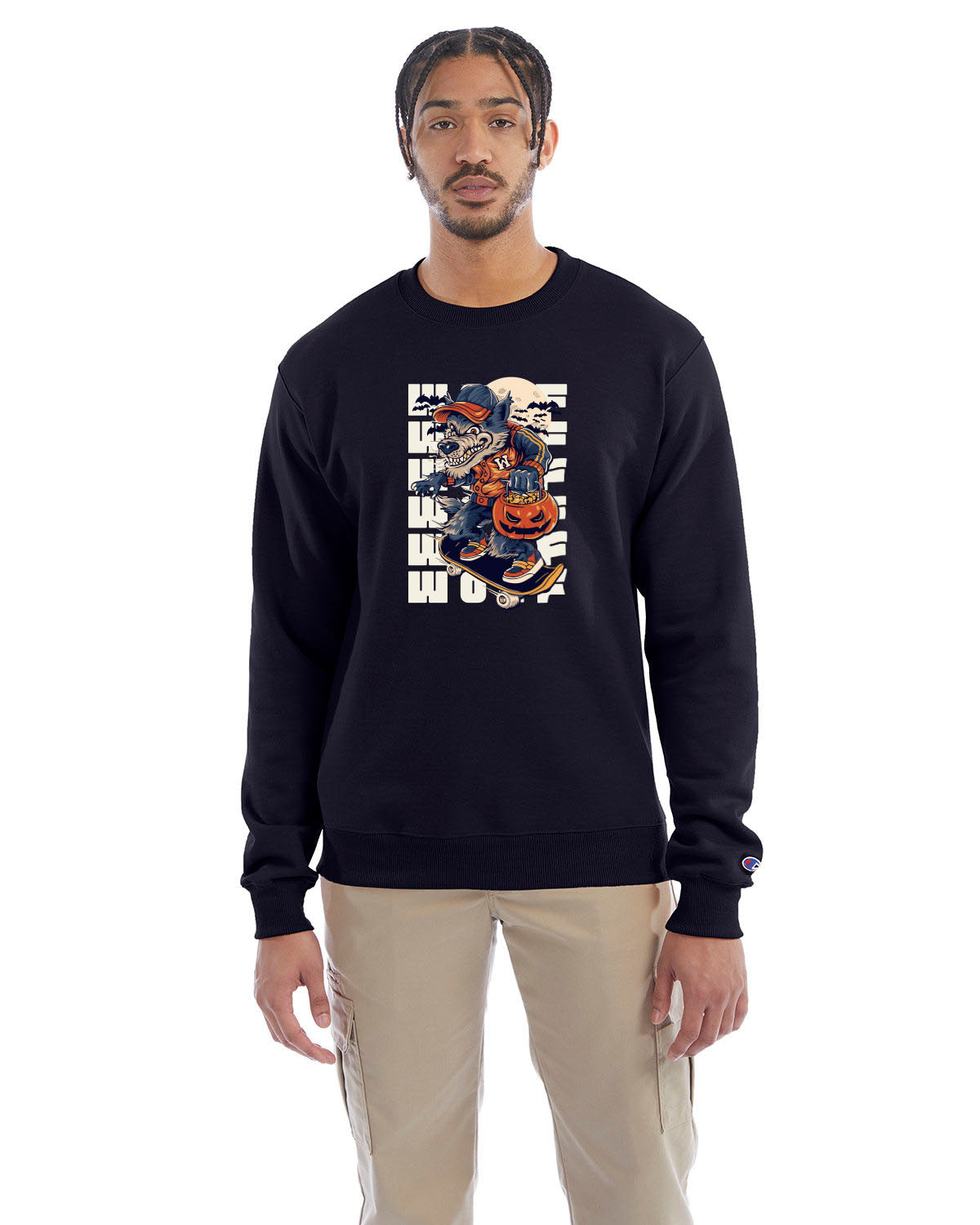Navy crewneck sweatshirt with a Halloween-themed graphic of a cartoon werewolf skateboarding with a pumpkin basket, worn by a model in beige pants.