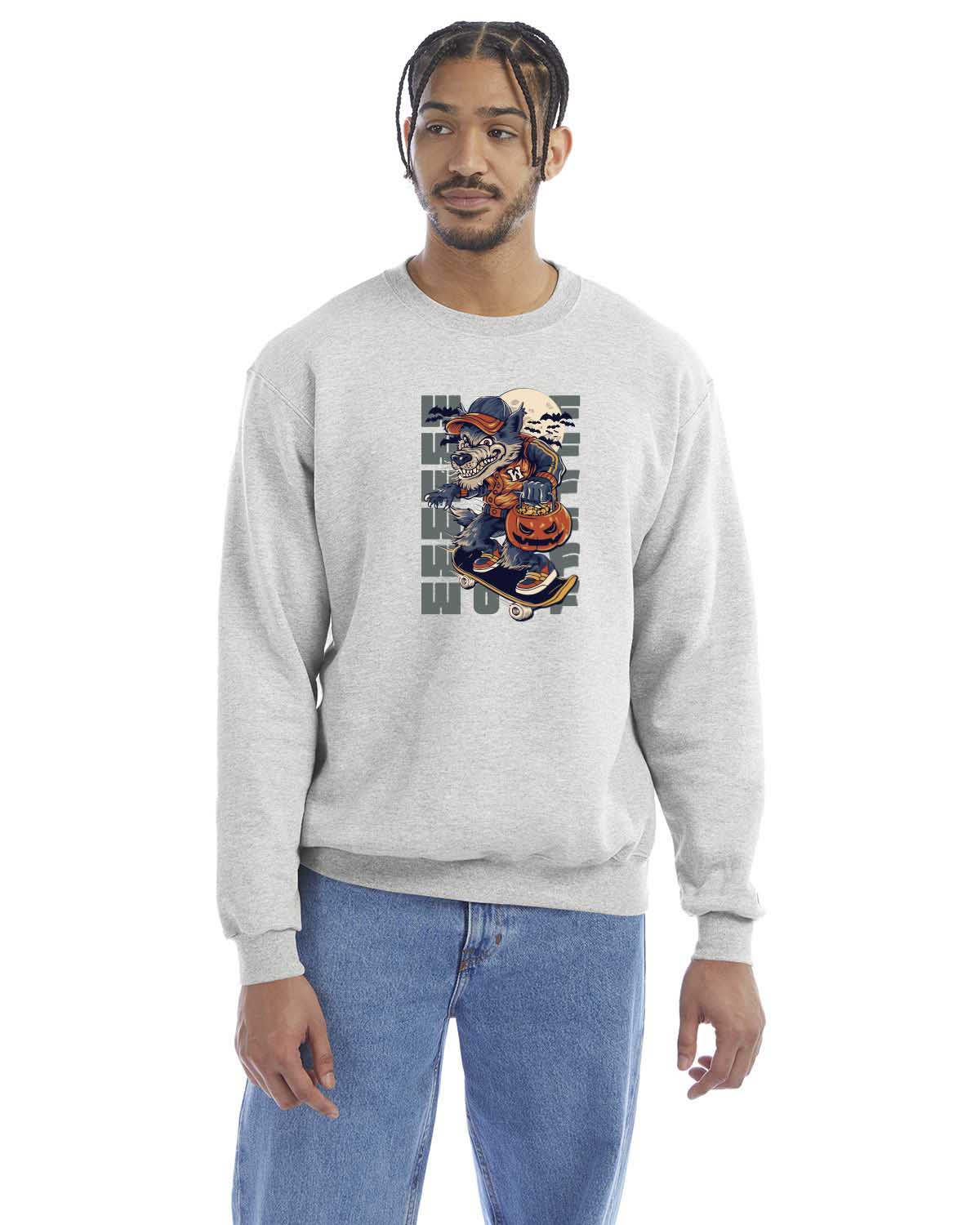 Silver grey crewneck sweatshirt with a Halloween-themed graphic of a cartoon werewolf skateboarding with a pumpkin basket, worn by a model in beige pants.