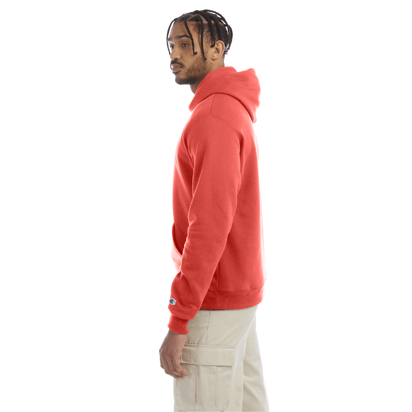 Side view of model wearing red Champion pullover hoodie with drawstring hood and ribbed cuffs.