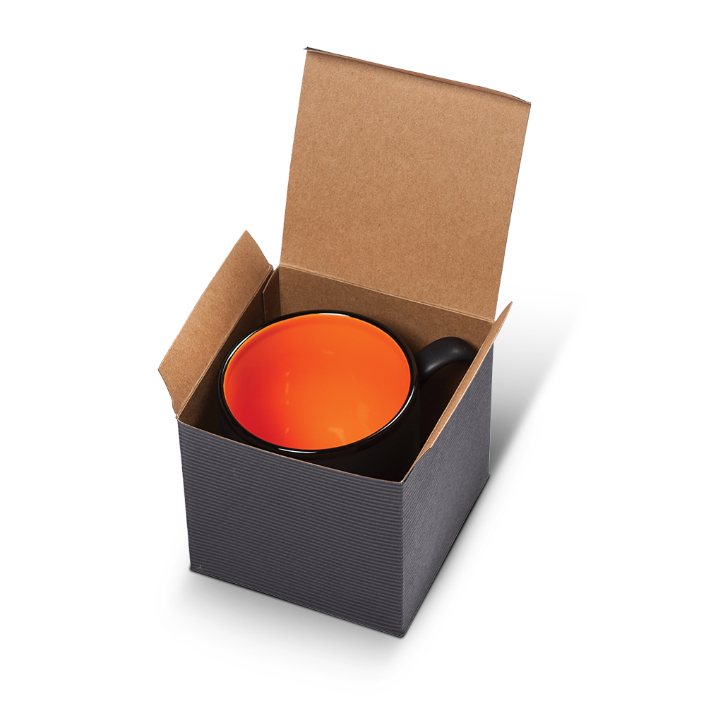Matte black ceramic mug with bright orange interior, packaged in an open kraft gift box.