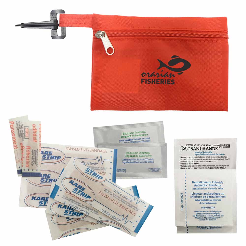 Orange first aid pouch with “Ontario Fisheries” logo, surrounded by assorted bandages, antibiotic ointments, and a sanitizing wipe.