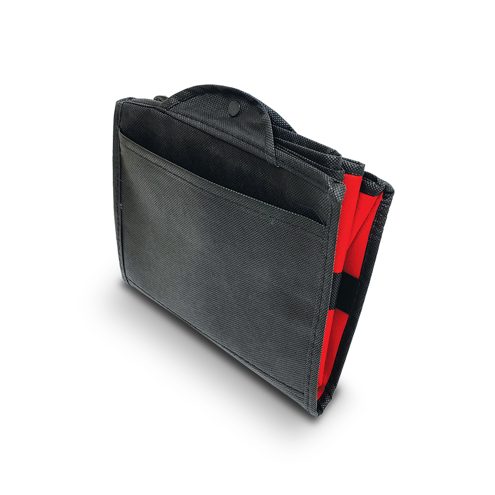 Folded view of a reusable shopping tote in black and red with a snap closure.