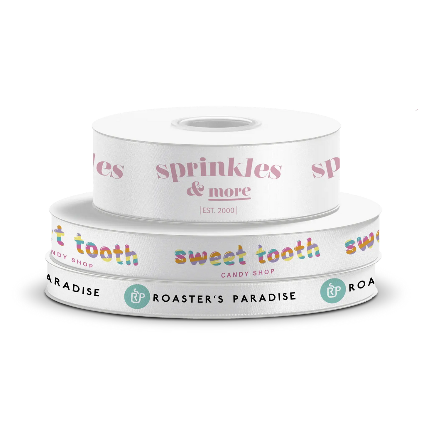 Stack of three custom white ribbon spools featuring various brand designs