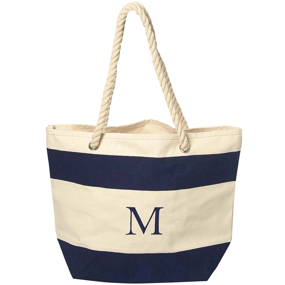 Beige and navy striped canvas tote bag with rope handles and monogrammed 'M'