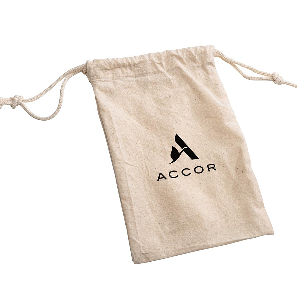 Natural cotton drawstring pouch featuring the black "ACCOR" custom logo printed on the front.