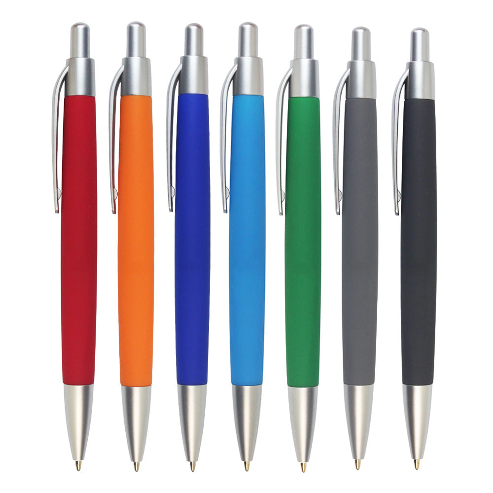 Set of seven retractable ballpoint pens in assorted colors, each with a silver clip and tip, designed for customizable branding.