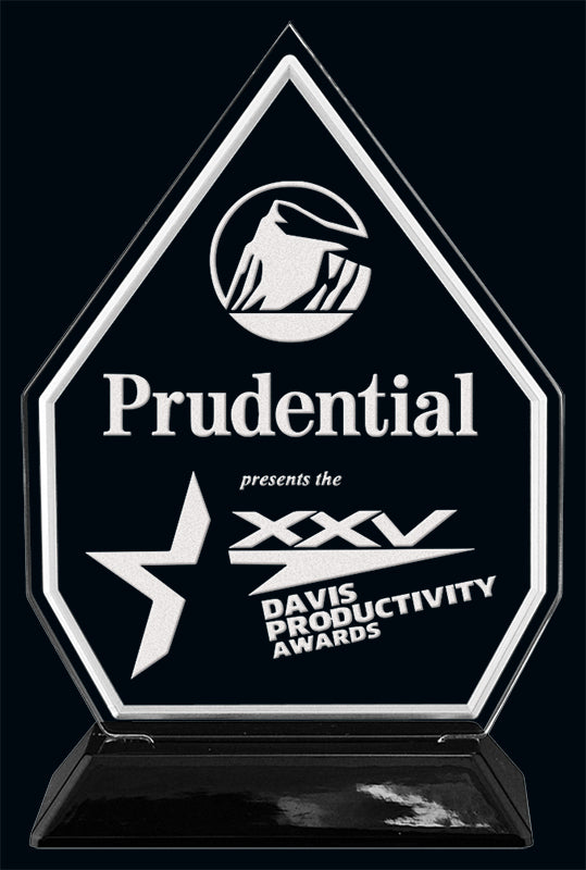 Black and clear crystal award presented by Prudential for the XXV Davis Productivity Awards, featuring a star motif and mountain logo.