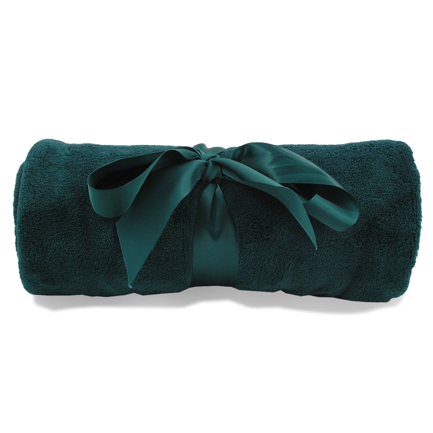 Rolled forest green plush blanket tied with a satin ribbon and embroidered with the logo.