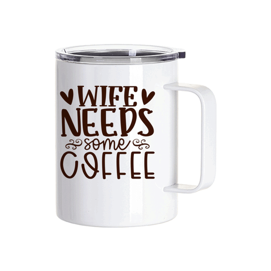 White insulated travel mug with a clear lid and the phrase “Wife Needs Some Coffee” printed in bold brown text with heart and swirl accents.
