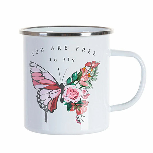 White enamel mug with a silver rim, featuring a pink butterfly and floral design with the text "YOU ARE FREE to fly" printed above.