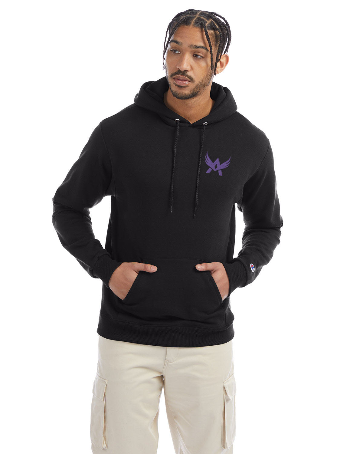 Model wearing a black Champion hoodie with a front kangaroo pocket and a purple abstract winged logo on the left chest