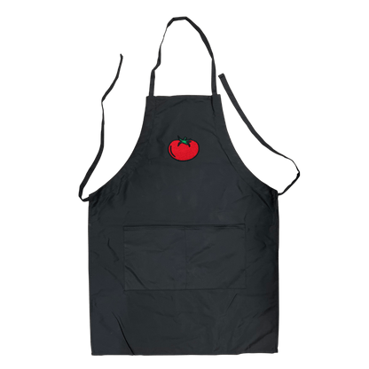 Black polyester-cotton apron with front pocket and embroidered red tomato logo centered on the chest.