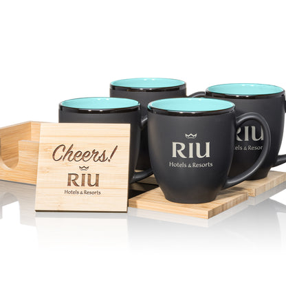 Matte black mugs with teal interiors, paired with engraved wooden coasters in a stylish gift set.