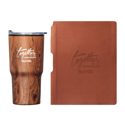 Woodgrain-patterned insulated tumbler with clear lid and leatherette journal, both customized with the "Together We Are Stronger – burda" logo in screen print and debossed finish.