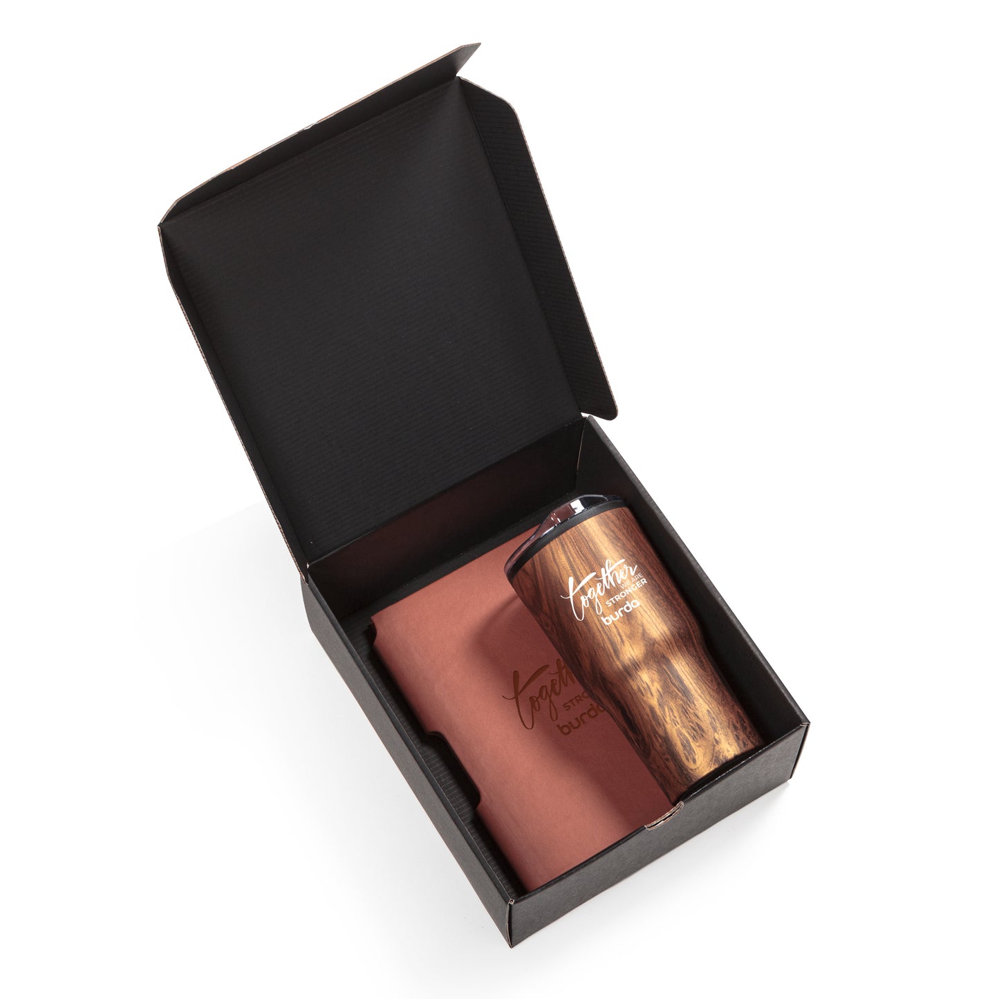 Custom gift set in a black presentation box featuring a woodgrain tumbler with screen printed “Together We Are Stronger – burda” logo and a matching leatherette journal with debossed logo.