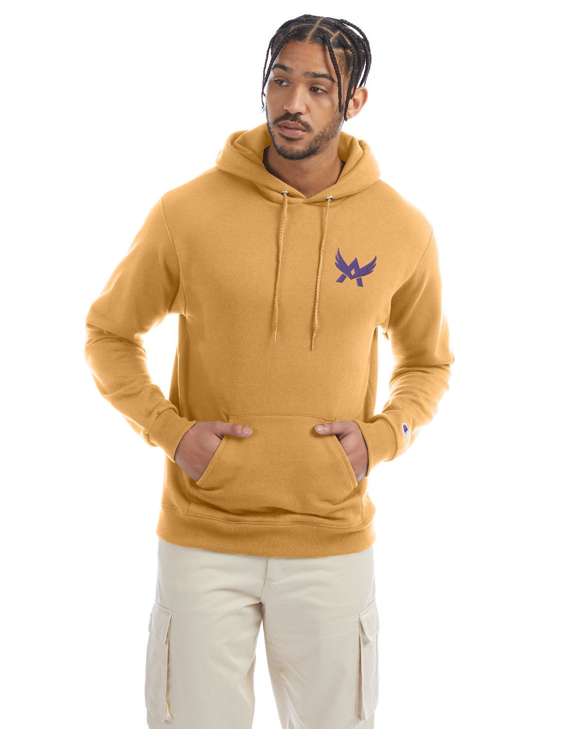 Model wearing a gold glint Champion hoodie with a front kangaroo pocket and a purple abstract winged logo on the left chest