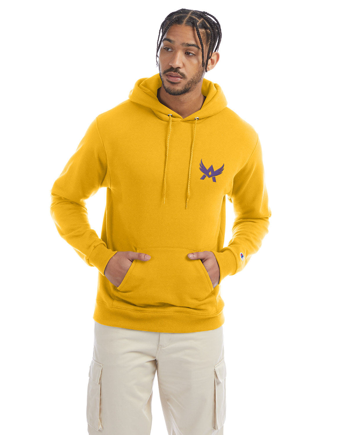 Model wearing a yellow Champion hoodie with a front kangaroo pocket and a purple abstract winged logo on the left chest