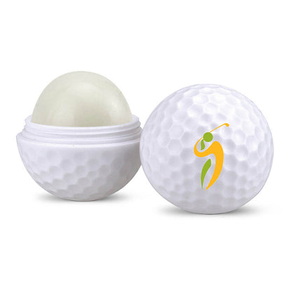Golf ball-shaped lip balm container with dimpled texture; one half open revealing balm, the other featuring a stylized golfer logo in yellow and green.