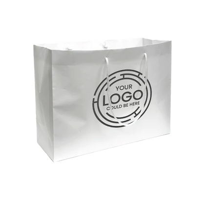 White paper shopping bag with white rope handles and a circular "YOUR LOGO COULD BE HERE" design printed in black on the front.