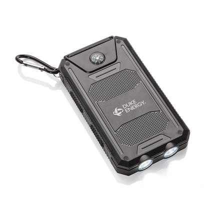 Customized black rugged power bank with dual LED flashlights, built-in compass, and carabiner clip, featuring a branded "Duke Energy" logo