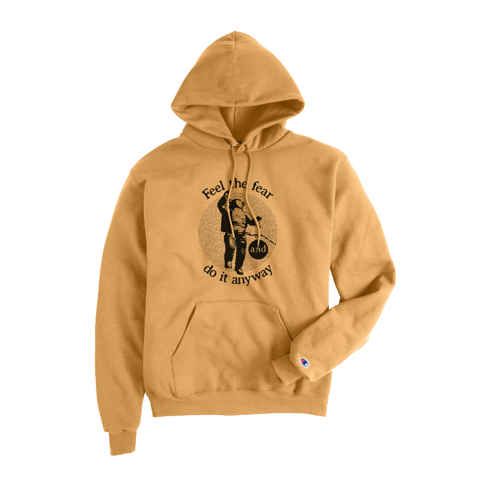 Golden brown Champion hoodie featuring a front graphic of a person standing with a bicycle inside a circular line pattern, accompanied by the motivational text “Feel the fear and do it anyway.” The Champion logo is embroidered on the left sleeve cuff.