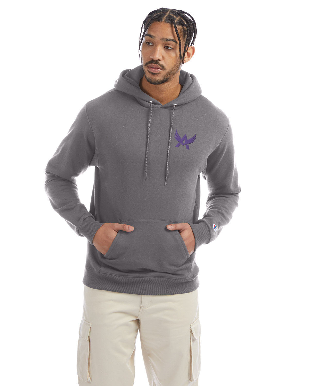 Model wearing a stone gray Champion hoodie with a front kangaroo pocket and a purple abstract winged logo on the left chest