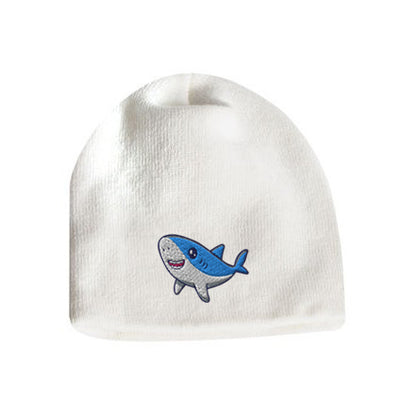 White acrylic knit beanie featuring a cute embroidered cartoon shark logo on the front.