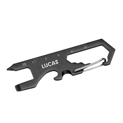 Claude Multi Tool with built-in ruler in black stainless steel, featuring multiple functions including bottle opener, screwdriver, wrench slots, and carabiner clip; customized with 'LUCAS' logo