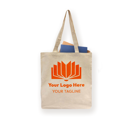 Beige cotton tote bag with long handles, printed with an open book logo and "Your Logo Here" text, shown filled with books.