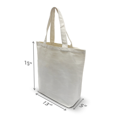 Side view of plain natural canvas tote bag with long handles, 13”W x 5”D x 15”H.