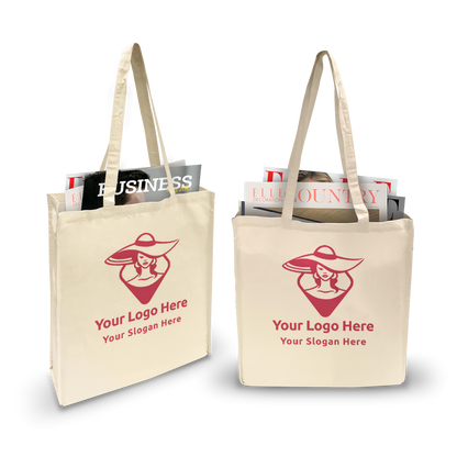 Beige 5oz canvas tote bags with gussets, custom red logo, filled with magazines, 15”W x 4”D x 16”H.