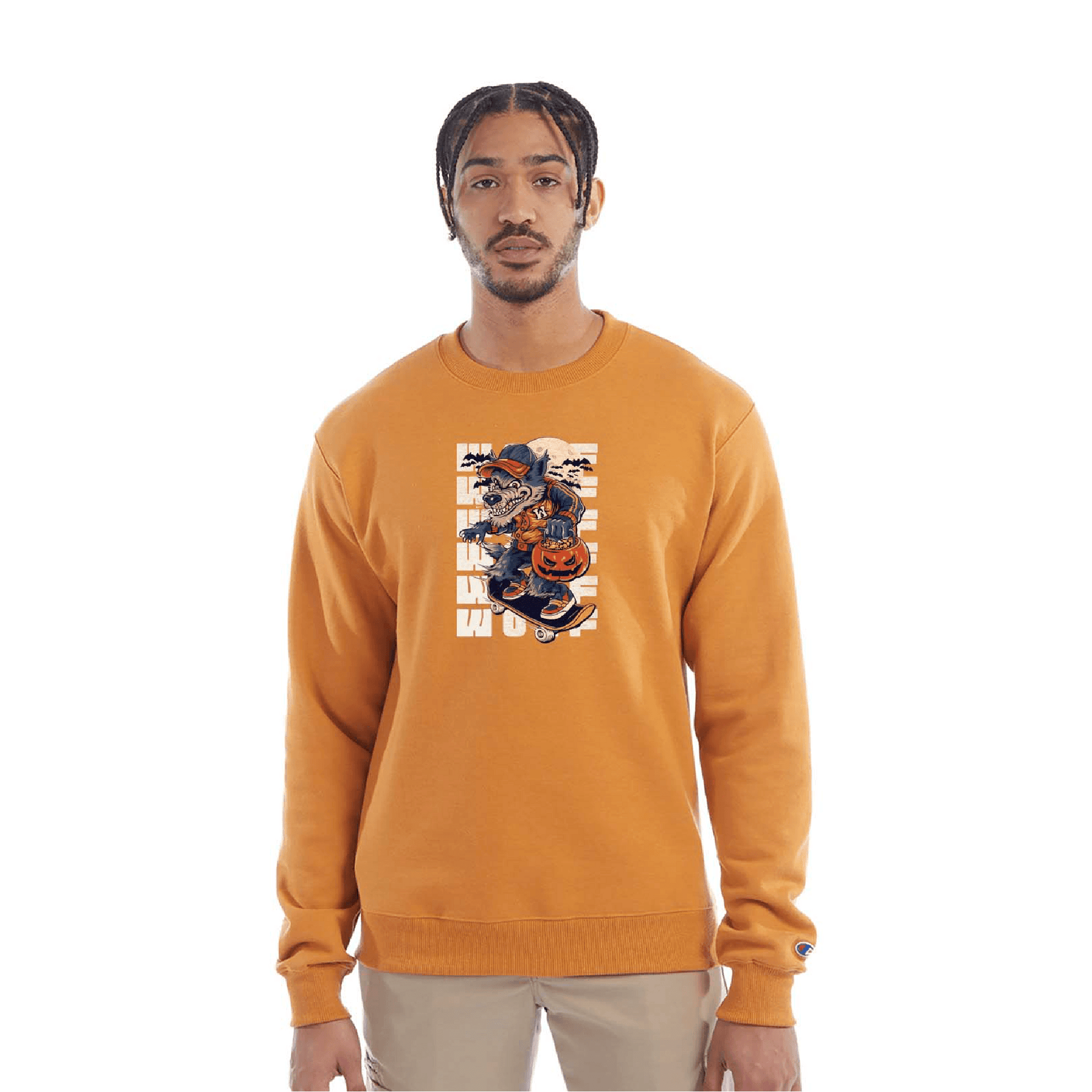 Golden yellow crewneck sweatshirt with a Halloween-themed graphic of a cartoon werewolf skateboarding with a pumpkin basket, worn by a model in beige pants.
