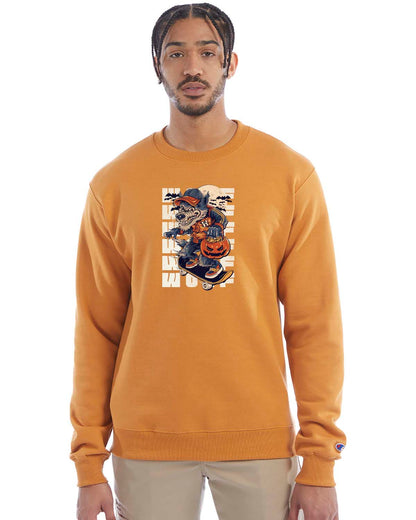 Gold glint crewneck sweatshirt with a Halloween-themed graphic of a cartoon werewolf skateboarding with a pumpkin basket, worn by a model in beige pants.