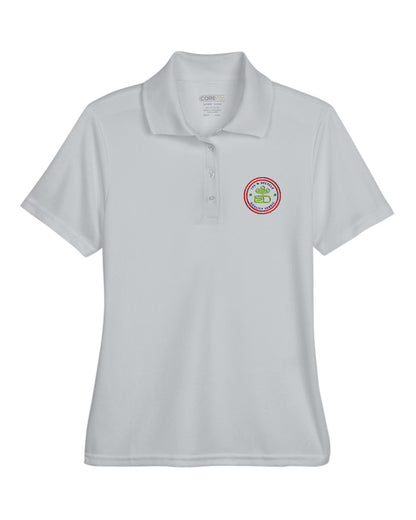 Platinum Core365 Ladies' Origin Performance Piqué Polo with short sleeves, a four-button placket, and a circular embroidered logo on the left chest.