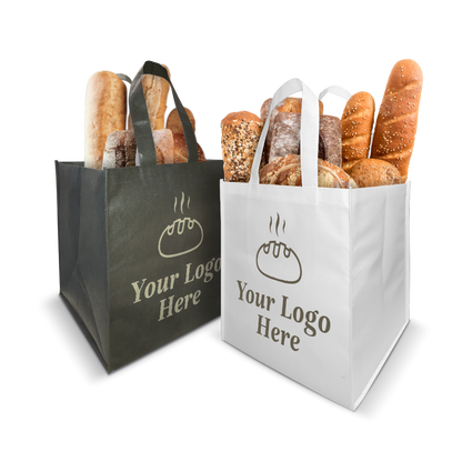 Reusable bakery tote bags in black and white, filled with assorted breads; features custom logo for branding.
