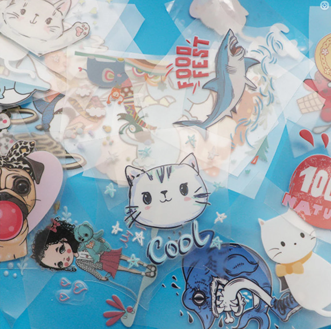 Assorted custom UV DTF stickers with colorful cartoon designs including a cat, shark, dog, and girl character, arranged on a blue background.